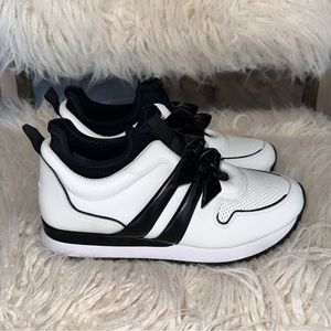 Alexandre Birman Clarita black and white sneakers.